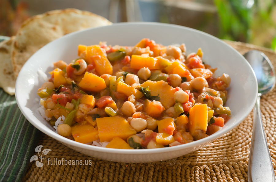Delicious Chickpea and Sweet Potato stew served on rice with flat bread