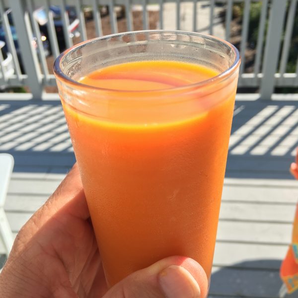 tel glass of carrot juice