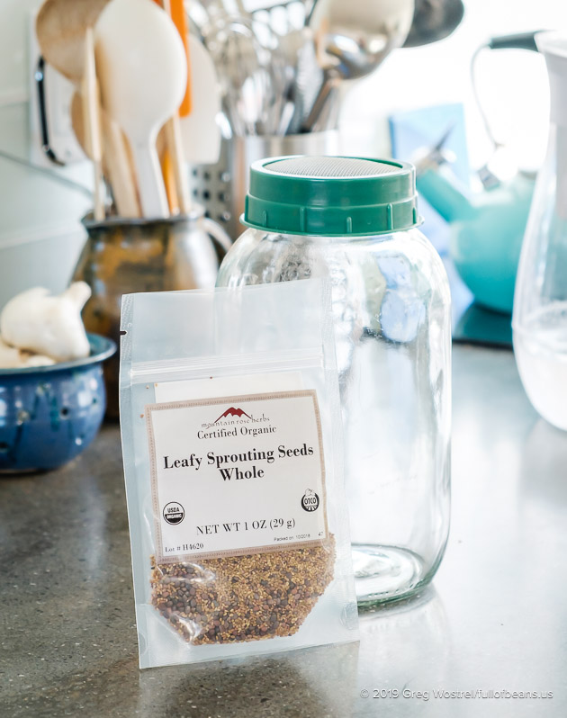 Packet of sprouting seeds with large jar