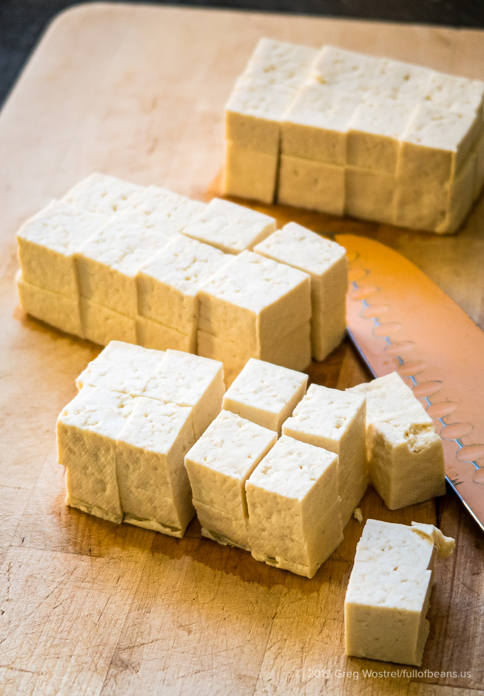 Tofu Cubes on Cutting Board