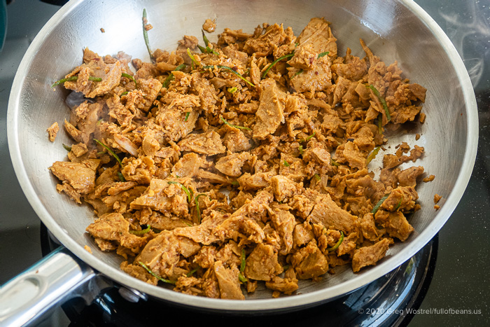 Vegan Taco filling Comrade Cluck cooking in a pan