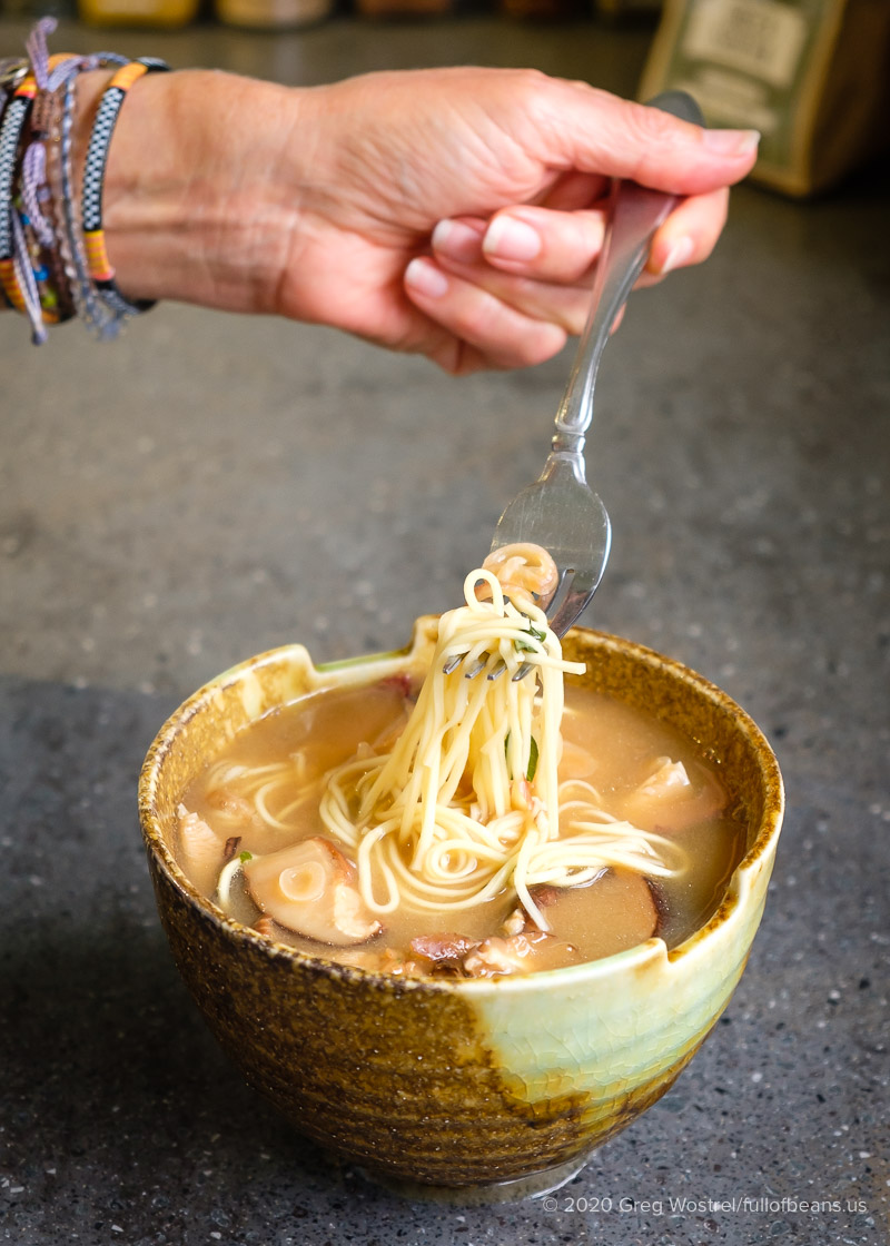 vegan miso noodle soup in a bowl showing noodles