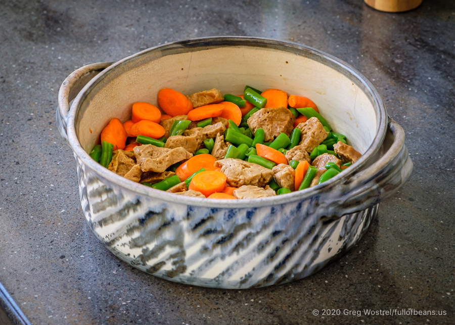 the first stage of making vegan Shepherd's pie - dish with veggies and seitan