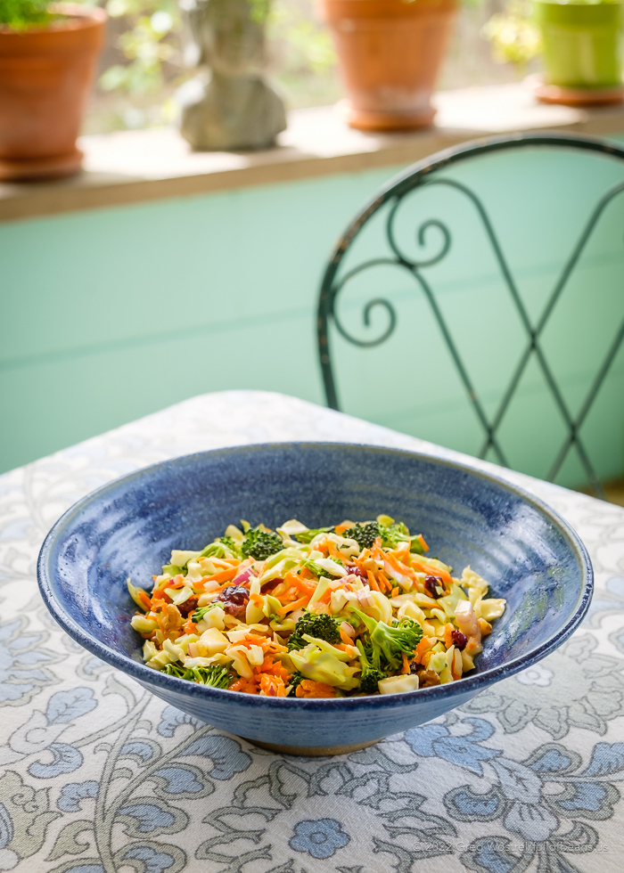 Not Your Mother's Coleslaw. Coleslaw in a blue bowl on a table.