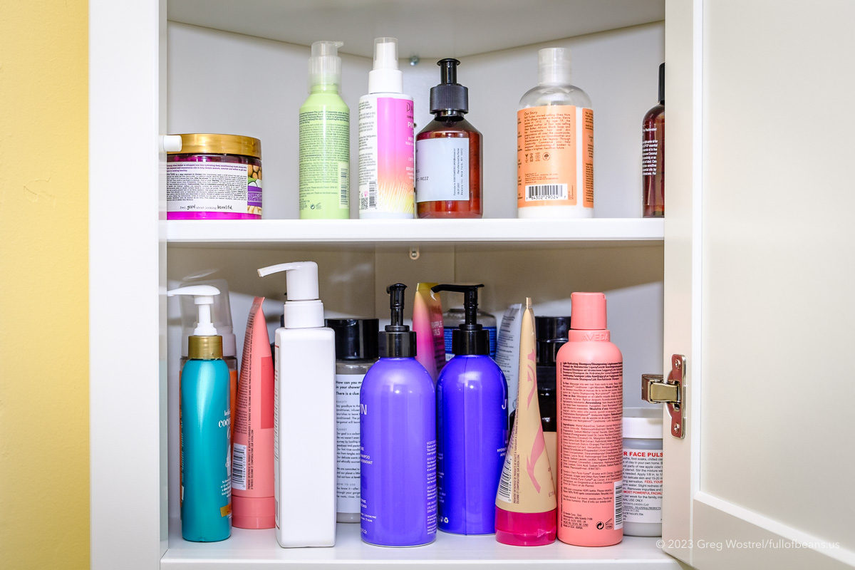"product graveyard" showing many discarded beauty products in a cabinet