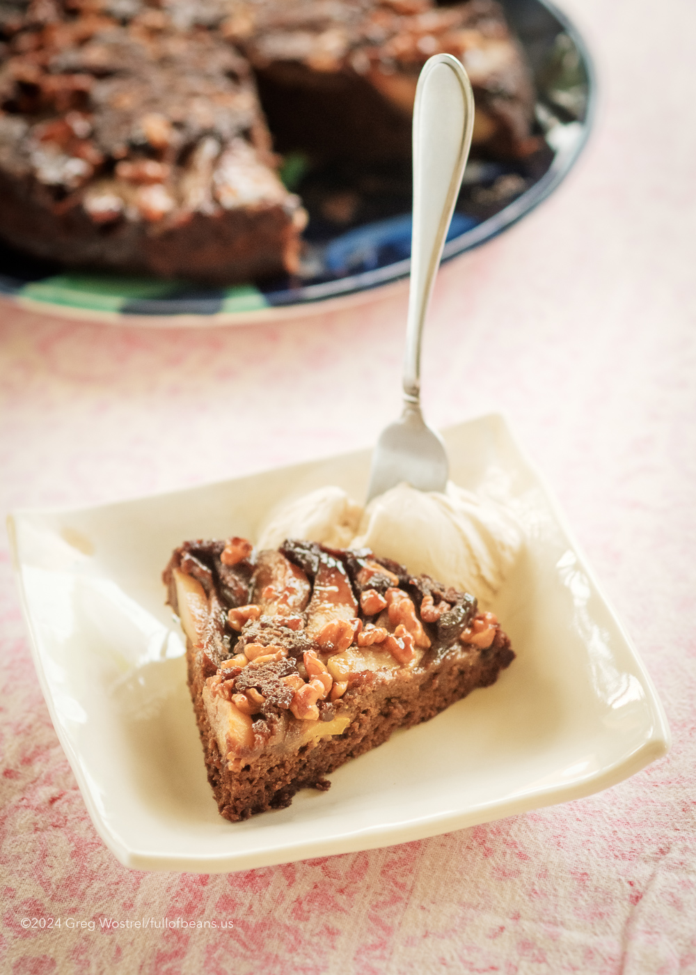 A slice of Pear Gingerbread Upside-down Cake on a Plate